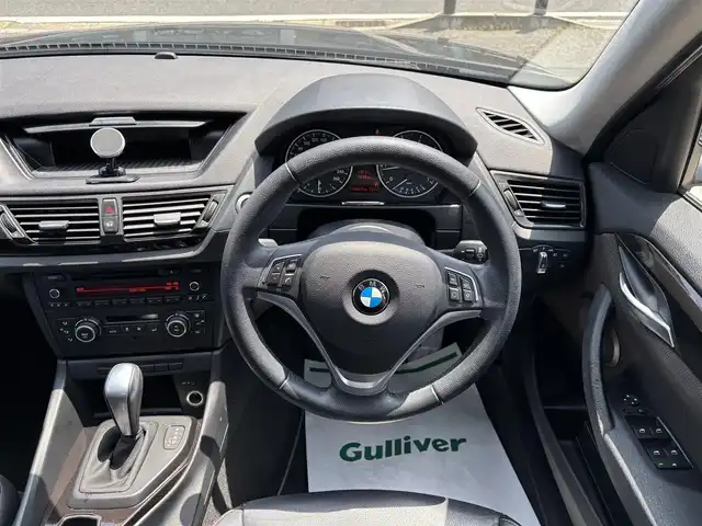 ＢＭＷ Ｘ１ sDrive 18i 京都府 2014(平26)年 7.7万km サファイアブラックP 禁煙車/ETC/AUX/ハーフレザー/キセノン/スマートキー２個/１８インチアルミホイール/保証書/