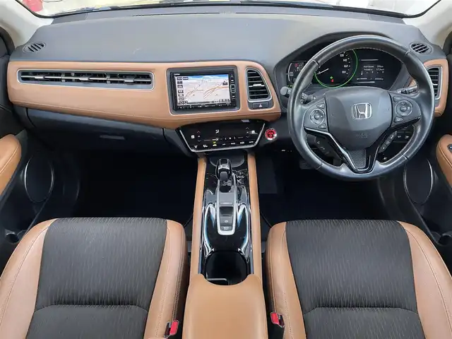 ホンダ ヴェゼル ハイブリッド Z ホンダセンシング 大阪府 2020(令2)年 5.5万km ミッドナイトブルービームM ホンダセンシング/　・追従式クルコン/　・車線逸脱/　・衝突軽減ブレーキ/純正SDナビゲーション/　Bluetooth/CD/DVD/フルセグ/FM/AM/バックカメラ/ハーフレザー/前席シートヒーター/純正17インチアルミ/革巻ステアリング/ステアリングシフト/ビルトインETC/プッシュスタート/電動パーキング/ブレーキホールド
