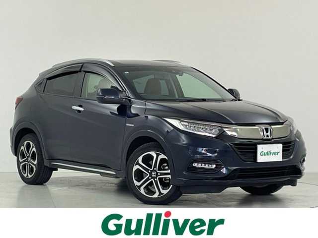 ホンダ ヴェゼル ハイブリッド Z ホンダセンシング 大阪府 2020(令2)年 5.5万km ミッドナイトブルービームM ホンダセンシング/　・追従式クルコン/　・車線逸脱/　・衝突軽減ブレーキ/純正SDナビゲーション/　Bluetooth/CD/DVD/フルセグ/FM/AM/バックカメラ/ハーフレザー/前席シートヒーター/純正17インチアルミ/革巻ステアリング/ステアリングシフト/ビルトインETC/プッシュスタート/電動パーキング/ブレーキホールド