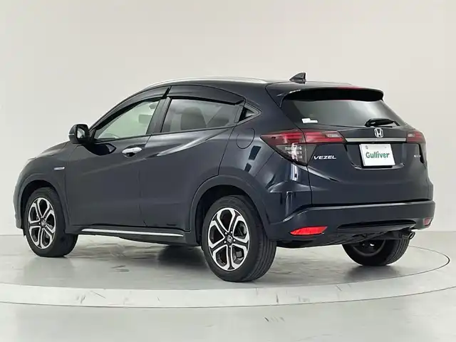 ホンダ ヴェゼル ハイブリッド Z ホンダセンシング 大阪府 2020(令2)年 5.5万km ミッドナイトブルービームM ホンダセンシング/　・追従式クルコン/　・車線逸脱/　・衝突軽減ブレーキ/純正SDナビゲーション/　Bluetooth/CD/DVD/フルセグ/FM/AM/バックカメラ/ハーフレザー/前席シートヒーター/純正17インチアルミ/革巻ステアリング/ステアリングシフト/ビルトインETC/プッシュスタート/電動パーキング/ブレーキホールド