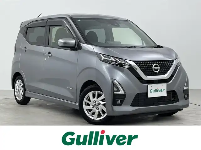 日産 デイズ HWS X プロパイロットED 大分県 2021(令3)年 8万km チタニウムグレーメタリック 純正９型ナビ/(CD/DVD/BT/SD/フルセグTV/FM/AM)/プロパイロット/エマージェンシーブレーキ/車線逸脱防止装置/車線逸脱警報装置/先行車発進お知らせ機能/速度標識認識機能/道路標識認識機能/ふらつき警報装置/全周囲カメラ/ドラレコ前方/オートマチックハイビーム/ETC/ヘッドライトレベライザー/電動格納ウィンカーミラー/ステアリングリモコン/ドアバイザー/プッシュスタート/スマートキー