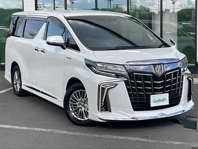 トヨタ アルファードハイブリット S タイプゴールド 道東・釧路十勝 2020(令2)年 5.8万km ホワイトパールクリスタルシャイン ・ワンオーナー /・4WD /・モデリスタエアロ /・シグネチャーイルミブレード（モデリスタ） /・フロントグリルカバー(モデリスタ) /・純正ディスプレイオーディオ /・TV/BT/・TVキャンセラー /・バックカメラ/・純正フリップダウンモニター /・デジタルインナーミラー /・両側パワースライドドア  /・ ToyotaSafetyS e n s e /・プリクラッシュセーフティ /・レーンキープア シ ス ト/・アダプティブハイビーム/・オートマチックハイビーム/・ロードサインアシスト/・クルーズコントロール/・先行車発進お知らせ/・ブレーキホールド/・クリアランスソナー/・ブラインドスポットモニター/・社外ドラレコ（前後）/・ETC2.0