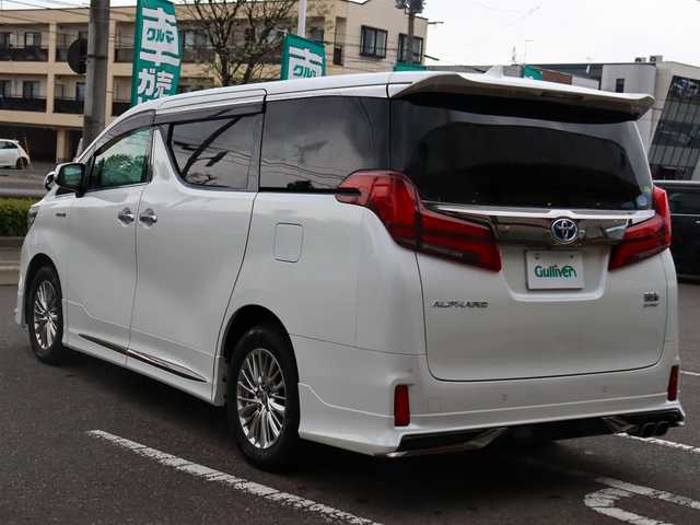 トヨタ アルファードハイブリット S タイプゴールド 道東・釧路十勝 2020(令2)年 5.8万km ホワイトパールクリスタルシャイン ワンオーナー /4WD /モデリスタエアロ /・シグネチャーイルミブレード（モデリスタ） /・フロントグリルカバー(モデリスタ) /純正ディスプレイオーディオ /・TV/BT/TVキャンセラー /バックカメラ/純正フリップダウンモニター /デジタルインナーミラー /両側パワースライドドア  / ToyotaSafetyS e n s e /・プリクラッシュセーフティ /・レーンキープア シ ス ト/・アダプティブハイビーム/・オートマチックハイビーム/・ロードサインアシスト/・クルーズコントロール/・先行車発進お知らせ/ブレーキホールド/クリアランスソナー/ブラインドスポットモニター/社外ドラレコ（前後）/ETC2.0