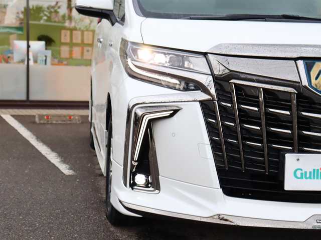 トヨタ アルファードハイブリット S タイプゴールド 道東・釧路十勝 2020(令2)年 5.8万km ホワイトパールクリスタルシャイン ワンオーナー /4WD /モデリスタエアロ /・シグネチャーイルミブレード（モデリスタ） /・フロントグリルカバー(モデリスタ) /純正ディスプレイオーディオ /・TV/BT/TVキャンセラー /バックカメラ/純正フリップダウンモニター /デジタルインナーミラー /両側パワースライドドア  / ToyotaSafetyS e n s e /・プリクラッシュセーフティ /・レーンキープア シ ス ト/・アダプティブハイビーム/・オートマチックハイビーム/・ロードサインアシスト/・クルーズコントロール/・先行車発進お知らせ/ブレーキホールド/クリアランスソナー/ブラインドスポットモニター/社外ドラレコ（前後）/ETC2.0