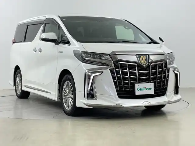 トヨタ アルファードハイブリット S タイプゴールド 道央・札幌 2020(令2)年 5.8万km ホワイトパールクリスタルシャイン ・ワンオーナー /・4WD /・モデリスタエアロ /・シグネチャーイルミブレード（モデリスタ） /・フロントグリルカバー(モデリスタ) /・純正ディスプレイオーディオ /・TV/BT/・TVキャンセラー /・バックカメラ/・純正フリップダウンモニター /・デジタルインナーミラー /・両側パワースライドドア  /・ ToyotaSafetyS e n s e /・プリクラッシュセーフティ /・レーンキープア シ ス ト/・アダプティブハイビーム/・オートマチックハイビーム/・ロードサインアシスト/・クルーズコントロール/・先行車発進お知らせ/・ブレーキホールド/・クリアランスソナー/・ブラインドスポットモニター/・社外ドラレコ（前後）/・ETC2.0