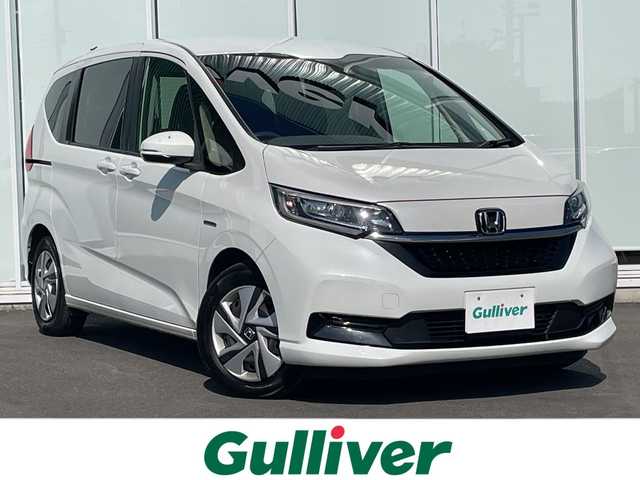 ホンダ フリード ハイブリット G ホンダセンシング 神奈川県 2020(令2)年 2.3万km プラチナホワイトパール 純正SDナビ /ワンセグＴＶ　/両側パワースライドドア /バックカメラ　/クルーズコントロール　/前席シートヒーター　/コーナーセンサー　/純正ドライブレコーダー　/ビルトインETC　/純正フロアマット/LED/取扱説明書/記録簿/保証書/衝突被害軽減システム