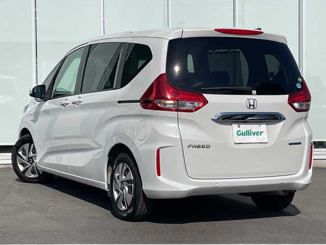 ホンダ フリード ハイブリット G ホンダセンシング 神奈川県 2020(令2)年 2.3万km プラチナホワイトパール 純正SDナビ /ワンセグＴＶ　/両側パワースライドドア /バックカメラ　/クルーズコントロール　/前席シートヒーター　/コーナーセンサー　/純正ドライブレコーダー　/ビルトインETC　/純正フロアマット/LED/取扱説明書/記録簿/保証書/衝突被害軽減システム