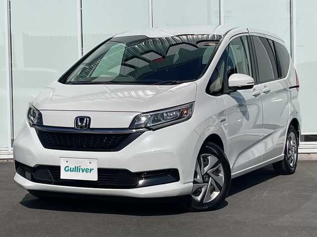 ホンダ フリード ハイブリット G ホンダセンシング 神奈川県 2020(令2)年 2.3万km プラチナホワイトパール 純正SDナビ /ワンセグＴＶ　/両側パワースライドドア /バックカメラ　/クルーズコントロール　/前席シートヒーター　/コーナーセンサー　/純正ドライブレコーダー　/ビルトインETC　/純正フロアマット/LED/取扱説明書/記録簿/保証書/衝突被害軽減システム