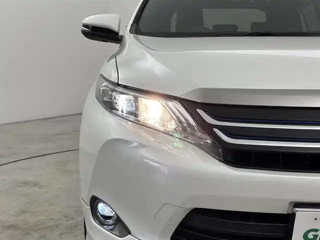 トヨタ ハリアー エレガンス 福岡県 2015(平27)年 7.4万km ホワイトパールクリスタルシャイン モデリスタエアロ　/純正ナビ／フルセグＴＶ　/バックカメラ　/ＥＴＣ　/プッシュスタート　/ステアリングリモコン　/横滑り防止装置　/ＭＴモード付ＡＴ　/ハーフレザーシート　/パワーシート　/社外２０インチＡＷ　/ＬＥＤヘッドライト