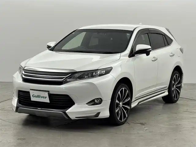 トヨタ ハリアー エレガンス 福岡県 2015(平27)年 7.4万km ホワイトパールクリスタルシャイン モデリスタエアロ　/純正ナビ／フルセグＴＶ　/バックカメラ　/ＥＴＣ　/プッシュスタート　/ステアリングリモコン　/横滑り防止装置　/ＭＴモード付ＡＴ　/ハーフレザーシート　/パワーシート　/社外２０インチＡＷ　/ＬＥＤヘッドライト