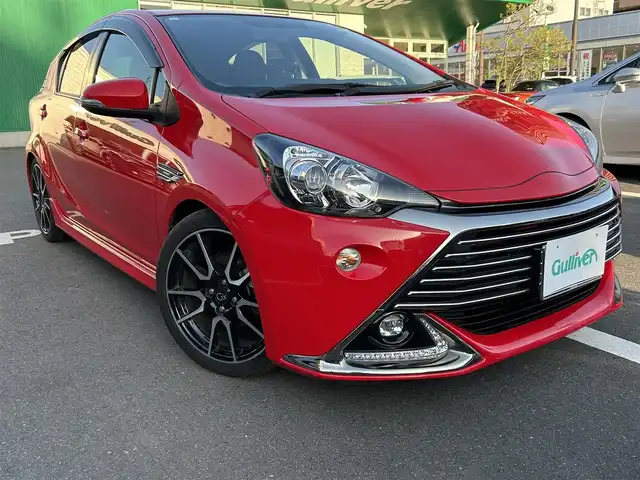 トヨタ アクア G G’s 島根県 2015(平27)年 3.8万km スーパーレッドⅤ 純正ナビ/（Ｂｌｕｅｔｏｏｔｈ/フルセグテレビ/CD/DVD)/バックカメラ/クルーズコントロール/前席シートヒーター/17インチＧ＇ｓアルミホイール/ナノイー/純正LEDヘッドライト/ＬＥＤＢＥＡＭスイッチ/Ｇ＇ｓフロアマット/横滑り防止装置/EV/エコドライブモード