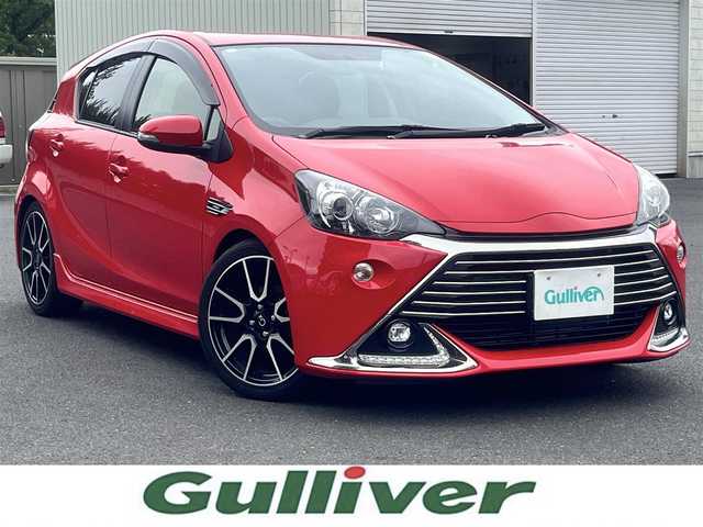 トヨタ アクア G G’s 島根県 2015(平27)年 3.8万km スーパーレッドⅤ 純正ナビ/（Ｂｌｕｅｔｏｏｔｈ/フルセグテレビ/CD/DVD)/バックカメラ/クルーズコントロール/前席シートヒーター/17インチＧ＇ｓアルミホイール/ナノイー/純正LEDヘッドライト/ＬＥＤＢＥＡＭスイッチ/Ｇ＇ｓフロアマット/横滑り防止装置/EV/エコドライブモード