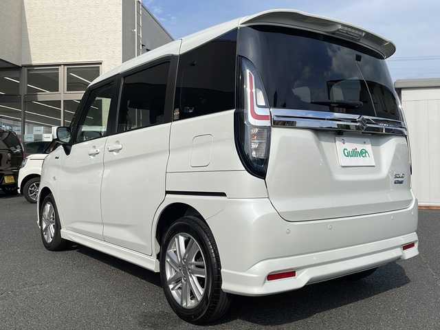 スズキ ソリオ HV MX 山形県 2023(令5)年 2.8万km ピュアホワイトP ４WD/社外ナビ/フルセグTV/Bluetooth接続/バックカメラ/左側パワースラウドドア/ドライブレコーダー/レーダークルーズコントロール/衝突軽減ブレーキ/前席シートヒーター/コーナーセンサー/ハロゲンヘッドライト/オートライト
