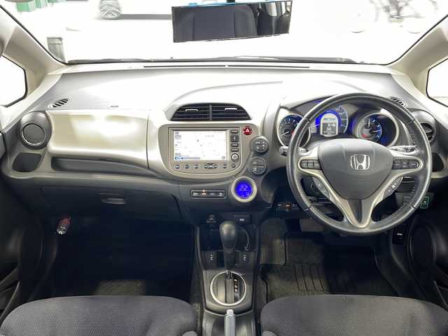 ホンダ フィット ハイブリット ナビ プレミアムセレクション 愛媛県 2011(平23)年 7.8万km プレミアムホワイトパール ワンオーナー/サンルーフ/・ガラスルーフ/HDDナビ/・ワンセグテレビ/・バックカメラ/・AM/FM/・CD/DVD/純正アルミホイール/ETC/スマートキー/ドアバイザー/ウィンカーミラー