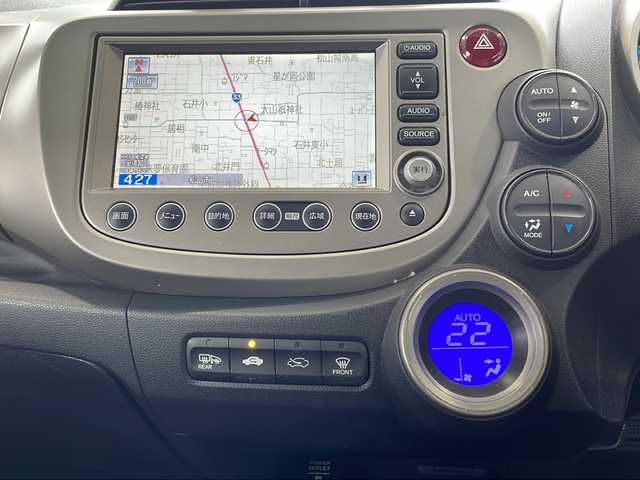 ホンダ フィット ハイブリット ナビ プレミアムセレクション 愛媛県 2011(平23)年 7.8万km プレミアムホワイトパール ワンオーナー/サンルーフ/・ガラスルーフ/HDDナビ/・ワンセグテレビ/・バックカメラ/・AM/FM/・CD/DVD/純正アルミホイール/ETC/スマートキー/ドアバイザー/ウィンカーミラー