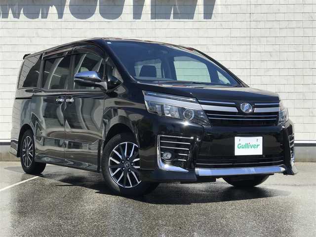 トヨタ ヴォクシー ZS 煌Ⅱ 富山県 2016(平28)年 7.8万km ブラック フリップダウンモニター/社外ナビ/フルセグTV/バックカメラ/衝突被害軽減ブレーキ/レーンキープアシスト/両側パワースライドドア/プッシュスタート/スマートキー/LEDヘッドライト/オートライト/社外AWスタッドレスタイヤ車載/ETC