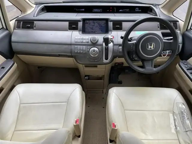 ホンダ ステップワゴン G 滋賀県 2007(平19)年 17.8万km パール 禁煙車/純正7インチナビ/CD・DVD・FM・Am/バックカメラ/ETC/片側パワースライドドア/スマートキー/スペアキー/オートエアコン/レザー調シートカバー/ステアリングスイッチ/15インチアルミホイール