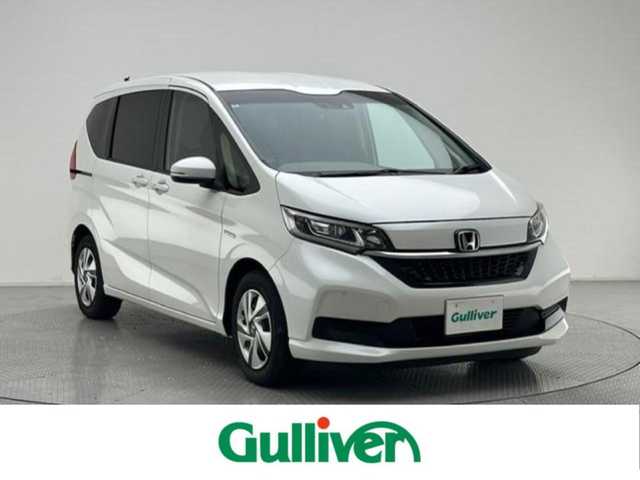 ホンダ フリード ハイブリット G ホンダセンシング 兵庫県 2020(令2)年 4.2万km プラチナホワイトパール 社外ナビ/パイオニア（AVIC-RZ８１０）/（フルセグ、CD、DVD、BT、MSV）/両側パワースライドドア/社外ドライブレコーダー（AG421‐DRC）/ビルトインETC/レーダークルーズコントロール/レーンキープアシスト/コーナーセンサー/PCS/標識認識/シートヒーター/ステアリングリモコン/LEDヘッドライト/オートライト