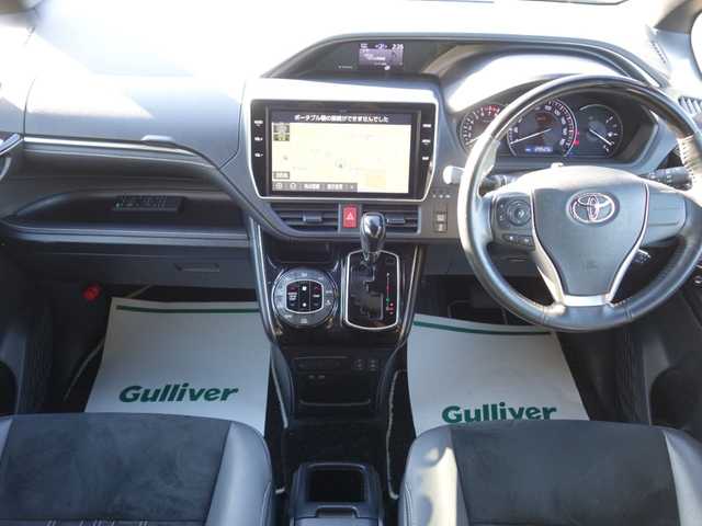 トヨタ エスクァイア Gi プレミアムパッケージ ブラックテーラード 山形県 2019(平31)年 13万km スパークリングブラックパールクリスタルシャイン 4WD/衝突被害軽減システム/TRDエアロ/フリップダウンモニター/純正SDナビ/　　【CD DVD BT フルセグ MSV】/バックカメラ/両側パワースライドドア/クルーズコントロール/LEDオートヘッドライト/ハーフレザーシート/シートヒーター/アイドリングストップ/ステアリンングヒーター/ステアリングスイッチ/MTモード付AT/電動格納ウィンカーミラー/フォグランプ/WAAC/スマートキー×2/ETC