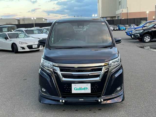 トヨタ エスクァイア Gi プレミアムパッケージ ブラックテーラード 山形県 2019(平31)年 13万km スパークリングブラックパールクリスタルシャイン 4WD/衝突被害軽減システム/TRDエアロ/フリップダウンモニター/純正SDナビ/　　【CD DVD BT フルセグ MSV】/バックカメラ/両側パワースライドドア/クルーズコントロール/LEDオートヘッドライト/ハーフレザーシート/シートヒーター/アイドリングストップ/ステアリンングヒーター/ステアリングスイッチ/MTモード付AT/電動格納ウィンカーミラー/フォグランプ/WAAC/スマートキー×2/ETC