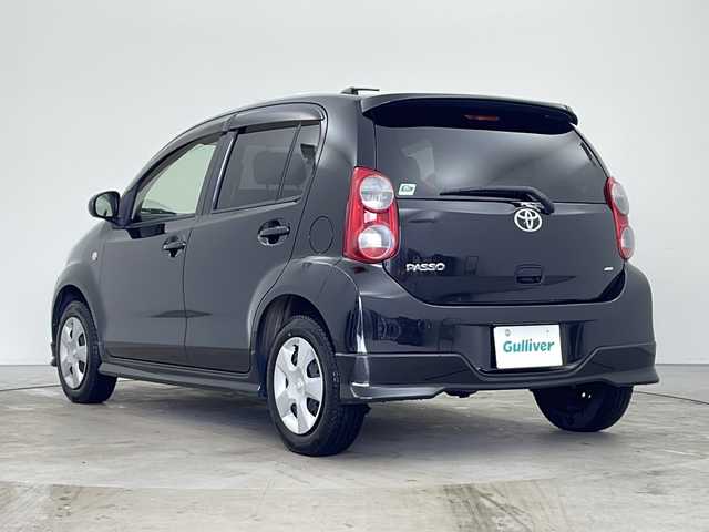 トヨタ パッソ X クツロギ 道東・釧路十勝 2012(平24)年 8.7万km ブラックマイカメタリック 4WD/社外SDナビ/ワンセグテレビ/フロントワイパーデアイサー/社外LEDヘッドランプ/ヘッドライトレベライザー/電動格納ドアミラー/純正フロアマット/ドアバイザー/シートリフター/アームレスト/Wエアバッグ/保証書・取説