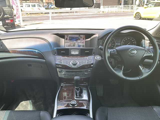 日産 フーガ 250GT 鳥取県 2011(平23)年 19.3万km クリスタルホワイトパール 純正メモリナビ/フルセグTV/CD/DVD/AM/FM/BT/AUX/ドライブモードセレクター/バックカメラ/助手席パワーオットマン/クルーズコントロール/プッシュスタート/ETC/マツダ純正アルミ