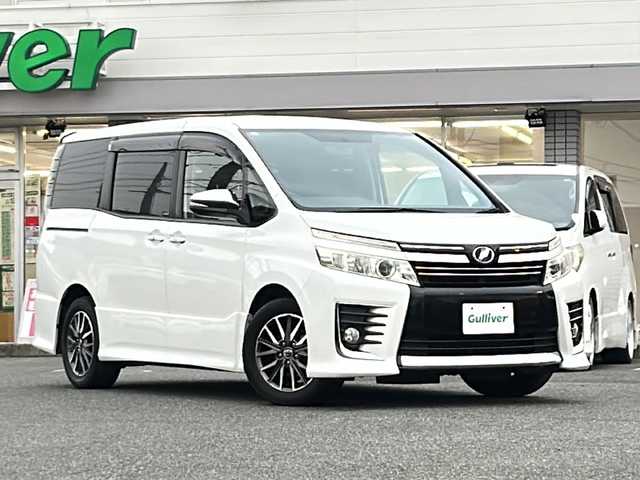 トヨタ ヴォクシー ZS 煌 愛知県 2015(平27)年 18.5万km ホワイトパールクリスタルシャイン /禁煙/ワンオーナー/整備記録簿H30.R1.2.3.4.5.6//純正ナビ/フルセグTV/BT/CD/DVD//バックカメラ/ETC//両側パワースライドドア//革巻きステア/ステアスイッチ/ステアチルト機構//二列目サンシェード/キャプテンシート/シートリフト//ACC/ABS/TVキャンセラー//アイドリングストップ/横滑り防止装置//プッシュスタート/スマートキー//純正16インチAW/スタッドレスタイヤ16インチAW//LEDオートライト/フォグランプ//ヘッドランプオートレベリング//電動格納ウィンカーミラー//スモークフィルム//純正フロアマット積載//純正ドアバイザー//保証書//取扱説明書//スペアスマートキー