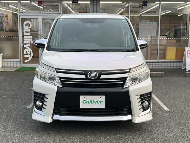 トヨタ ヴォクシー ZS 煌 愛知県 2015(平27)年 18.5万km ホワイトパールクリスタルシャイン /禁煙/ワンオーナー/整備記録簿H30.R1.2.3.4.5.6//純正ナビ/フルセグTV/BT/CD/DVD//バックカメラ/ETC//両側パワースライドドア//革巻きステア/ステアスイッチ/ステアチルト機構//二列目サンシェード/キャプテンシート/シートリフト//ACC/ABS/TVキャンセラー//アイドリングストップ/横滑り防止装置//プッシュスタート/スマートキー//純正16インチAW/スタッドレスタイヤ16インチAW//LEDオートライト/フォグランプ//ヘッドランプオートレベリング//電動格納ウィンカーミラー//スモークフィルム//純正フロアマット積載//純正ドアバイザー//保証書//取扱説明書//スペアスマートキー