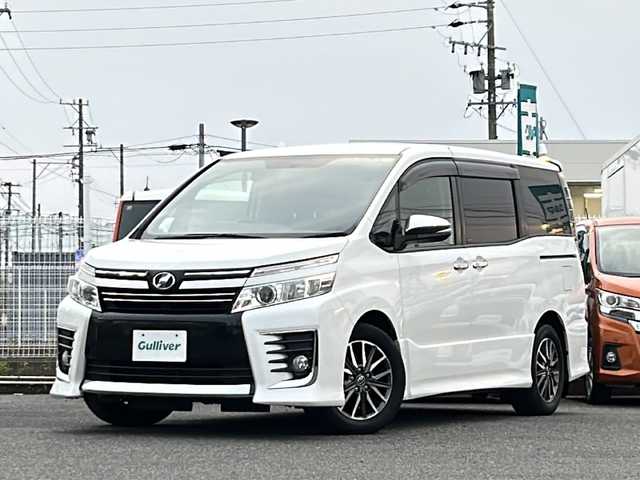 トヨタ ヴォクシー ZS 煌 愛知県 2015(平27)年 18.5万km ホワイトパールクリスタルシャイン /禁煙/ワンオーナー/整備記録簿H30.R1.2.3.4.5.6//純正ナビ/フルセグTV/BT/CD/DVD//バックカメラ/ETC//両側パワースライドドア//革巻きステア/ステアスイッチ/ステアチルト機構//二列目サンシェード/キャプテンシート/シートリフト//ACC/ABS/TVキャンセラー//アイドリングストップ/横滑り防止装置//プッシュスタート/スマートキー//純正16インチAW/スタッドレスタイヤ16インチAW//LEDオートライト/フォグランプ//ヘッドランプオートレベリング//電動格納ウィンカーミラー//スモークフィルム//純正フロアマット積載//純正ドアバイザー//保証書//取扱説明書//スペアスマートキー