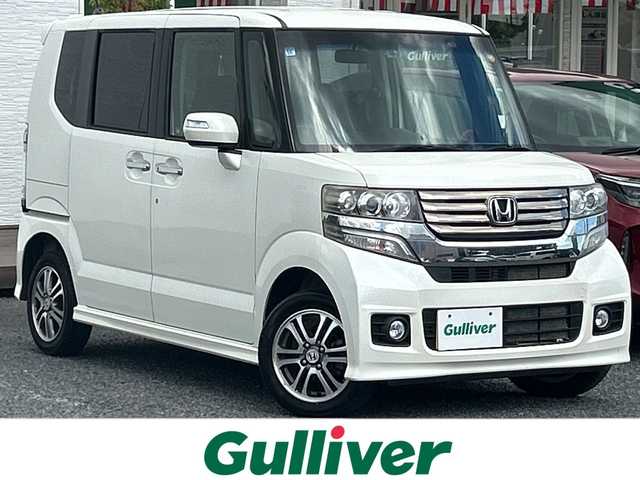 ホンダ Ｎ ＢＯＸ カスタム G Lパッケージ 千葉県 2013(平25)年 1.7万km プレミアムホワイトパール ４ＷＤ　ナビＶＸＭ－１２８ＶＳＸｉ　バックカメラ　ＥＴＣ　ドラレコ　ＤＶＤ　パワースライド　チップアップシート　フロアマット純正　スマートキー オートライト　１４インチＡＷ リアスポイラー