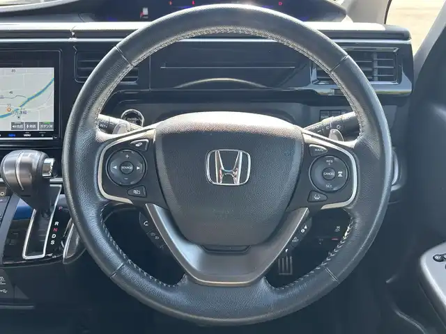 ホンダ ステップワゴン スパーダ クルスピセンシング 鹿児島県 2019(令1)年 6.9万km パール ホンダセンシング/純正ナビ/（Bluetooth/フルセグTV/CD/DVD/HDMI）/バックカメラ/両側パワースライドドア/レーダークルーズコントロール/LEDヘッドライト/ハーフレザーシート/前席シートヒーター/純正16インチアルミホイール/USB/スマートキー/ETC