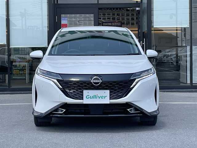 日産 オーラ G レザーエディション 茨城県 2022(令4)年 1.2万km ピュアホワイトパール 純正ナビ/【AM・FM・TV・BT・USB】/プロパイロット/レーダークルコン/ETC2.0/全方位カメラ/前後コーナーセンサー/ワイヤレス充電/ステリモ/ブレーキホールド/インテリジェントルームミラー/純正フロアマット/社外アルミホイール/オートライト/オートハイビーム/Fフォグ/LEDライト/ハンドル支援