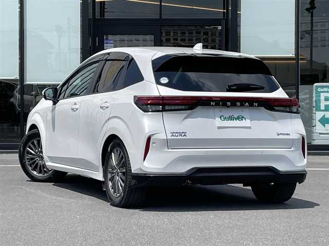 日産 オーラ G レザーエディション 茨城県 2022(令4)年 1.2万km ピュアホワイトパール 純正ナビ/【AM・FM・TV・BT・USB】/プロパイロット/レーダークルコン/ETC2.0/全方位カメラ/前後コーナーセンサー/ワイヤレス充電/ステリモ/ブレーキホールド/インテリジェントルームミラー/純正フロアマット/社外アルミホイール/オートライト/オートハイビーム/Fフォグ/LEDライト/ハンドル支援