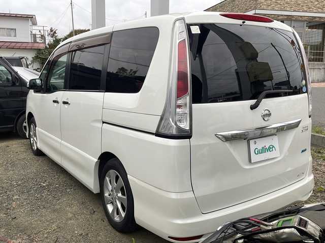 日産 セレナ ハイウェイスター 福島県 2010(平22)年 15.4万km ブリリアントホワイトパール 純正HDDナビ/・TV/・DISC（CD＆DVD）/・FM＆AM/・AUX/ステアリングボタン/クルーズコントロール（追従無し）/電動格納ミラー/純正フリップダウンモニター/（リモコン付き）/後列サンシェード/キセノンライト/フォグランプ/純正ビルトインETC/横滑り防止装置/アイドリングストップ/ABS/純正ドアバイザー/純正フロアマット