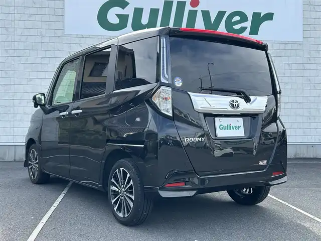 トヨタ ルーミー カスタムG－T 静岡県 2024(令6)年 1.4万km ブラックマイカメタリック ターボ車/純正ディスプレイオーディオ/(AM/FM/BT/AppleCarplay/Androidauto)/フルセグTV/全方位カメラ/バックカメラ/電動パーキングブレーキ/オートホールド/前席シートヒーター/両側パワースライドドア/レーダークルーズコントロール/前後型ドライブレコーダー/横滑り防止装置/衝突被害軽減システム/盗難防止装置/前後コーナーセンサー/ビルトインETC/プッシュスタート/スマートキー/スペアキー×1/LEDヘッドライト/純正15インチアルミホイール/純正フロアマット/取扱説明書
