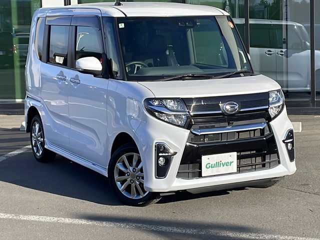 ダイハツ タント カスタム X セレクション 道東・釧路十勝 2020(令2)年 5.7万km シャイニングホワイトパール ・4WD/・ワンオーナー/・純正SDナビ/（フルセグ AM FM CD DVD USB BT）/・両側パワースライドドア/・コーナーセンサー/・LEDフォグランプ/・ベンチシート/・シートヒーターD/N/・パーキングアシスト/・アイドリングストップ/・横滑り防止機能/・衝突被害軽減システム/・オートライト/・プッシュスタート/・ドアバイザー/・エンジンスターター/・保証書/・取扱説明書