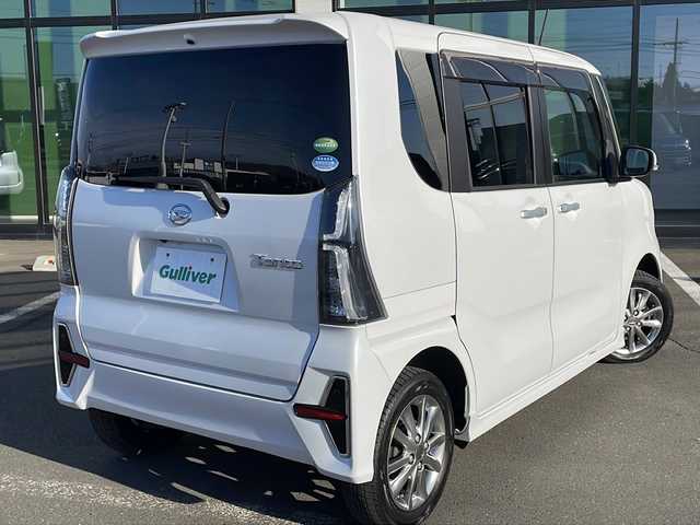 ダイハツ タント カスタム X セレクション 道東・釧路十勝 2020(令2)年 5.7万km シャイニングホワイトパール ・4WD/・ワンオーナー/・純正SDナビ/（フルセグ AM FM CD DVD USB BT）/・両側パワースライドドア/・コーナーセンサー/・LEDフォグランプ/・ベンチシート/・シートヒーターD/N/・パーキングアシスト/・アイドリングストップ/・横滑り防止機能/・衝突被害軽減システム/・オートライト/・プッシュスタート/・ドアバイザー/・エンジンスターター/・保証書/・取扱説明書