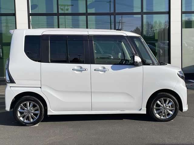 ダイハツ タント カスタム X セレクション 道東・釧路十勝 2020(令2)年 5.7万km シャイニングホワイトパール ・4WD/・ワンオーナー/・純正SDナビ/（フルセグ AM FM CD DVD USB BT）/・両側パワースライドドア/・コーナーセンサー/・LEDフォグランプ/・ベンチシート/・シートヒーターD/N/・パーキングアシスト/・アイドリングストップ/・横滑り防止機能/・衝突被害軽減システム/・オートライト/・プッシュスタート/・ドアバイザー/・エンジンスターター/・保証書/・取扱説明書