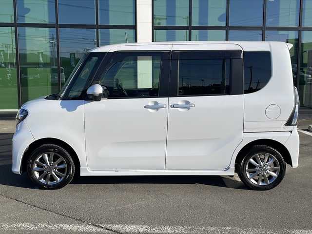 ダイハツ タント カスタム X セレクション 道東・釧路十勝 2020(令2)年 5.7万km シャイニングホワイトパール ・4WD/・ワンオーナー/・純正SDナビ/（フルセグ AM FM CD DVD USB BT）/・両側パワースライドドア/・コーナーセンサー/・LEDフォグランプ/・ベンチシート/・シートヒーターD/N/・パーキングアシスト/・アイドリングストップ/・横滑り防止機能/・衝突被害軽減システム/・オートライト/・プッシュスタート/・ドアバイザー/・エンジンスターター/・保証書/・取扱説明書