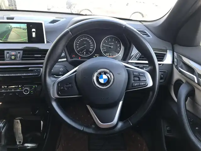 ＢＭＷ Ｘ１ xDrive 20i xライン ハイラインパッケージ 富山県 2015(平27)年 5.6万km 茶 4WD/サンルーフ/純正ナビ/Bluetooth/バックカメラ/衝突被害軽減ブレーキ/コーナーセンサー/レーンキープアシスト/レザーシート/ブラウンレザー調シートカバー/プッシュスタート/スマートキー/革巻きステアリング/シートヒーター/LEDヘッドライト/オートライト/ETC
