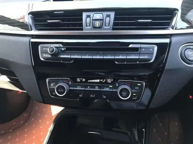 ＢＭＷ Ｘ１ xDrive 20i xライン ハイラインパッケージ 富山県 2015(平27)年 5.6万km 茶 4WD/サンルーフ/純正ナビ/Bluetooth/バックカメラ/衝突被害軽減ブレーキ/コーナーセンサー/レーンキープアシスト/レザーシート/ブラウンレザー調シートカバー/プッシュスタート/スマートキー/革巻きステアリング/シートヒーター/LEDヘッドライト/オートライト/ETC