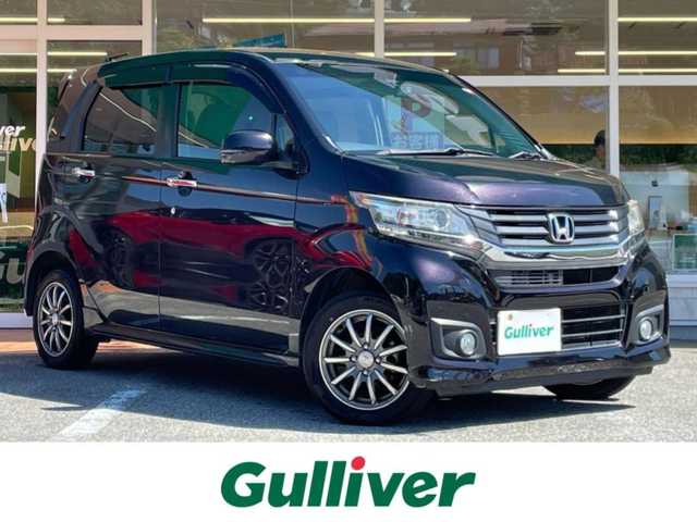 ホンダ Ｎ ＷＧＮ カスタム G Aパッケージ 岐阜県 2014(平26)年 7.6万km プレミアムゴールドパープルパール 4WD/純正ナビ/【CD.DVD.TV.Bluetooth．AM/FMラジオ】/バックカメラ/スマートキー/プッシュスタートボタン/クルーズコントロール/シティブレーキアクティブシステム/ベンチシート/オートライト/フォグライト/積込スタッドレスタイヤ/ドアバイザー/ウィンカーミラー/純正アルミホイール/純正フロアマット/取扱説明書/スペアキー