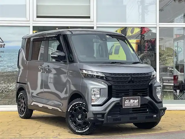 三菱 ｅＫクロススペース T 道北・旭川 2021(令3)年 2.8万km チタニウムグレーメタリック AIS検査済み/【2411013609】/MTモード付/純正LEDヘッドライト/オートライト/オートマチックハイビーム/片側パワースライドドア/ドライブレコーダー/USB入力端子/ケンウッドSDナビ/フルセグテレビ/バックカメラ/フロントカメラ/前席シートヒーター/レーンキープアシスト/ヒルディセントコントロール/衝突被害軽減ブレーキ/障害物センサー/15インチAW　マッドバーンXR-910K（社外）/トーヨー　オープンカントリーR/T　165/65-15（新品）/1インチリフトアップコイル（社外）/ZERO　HOUSE　ブルバー（社外）/フロントカメラ＆モニター（社外）/サイドデカール/社外パーツ取付有