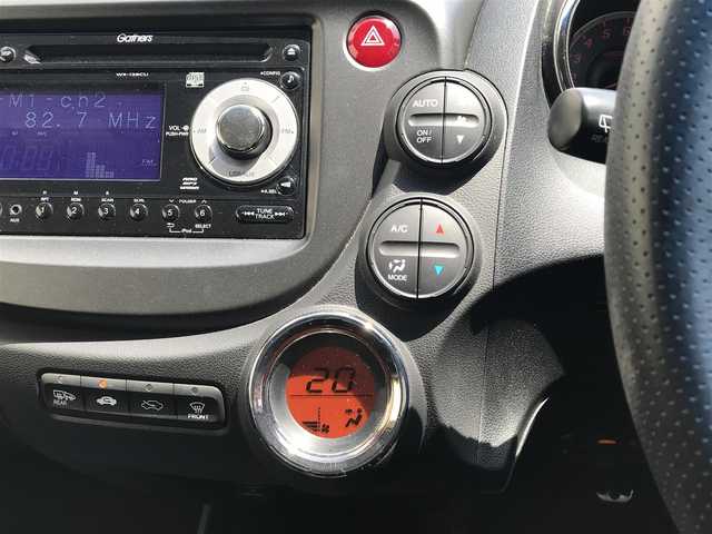 ホンダ フィット RS 富山県 2013(平25)年 8.3万km プレミアムイエローパールⅡ 6速MT/カーオーディオ/スマートキー/横滑り防止装置/革巻きステアリング/HIDヘッドライト/オートライト/電動格納ミラー/ウインカーミラー/フォグランプ/純正AWサマータイヤ車載/ETC