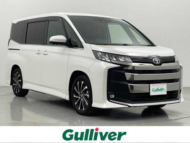 トヨタ ノア S－Z 熊本県 2022(令4)年 2.1万km ホワイトパールクリスタルシャイン ワンオーナー　/禁煙車　/純正10.5インチナビ（ＣＤ・ＤＶＤ・フルセグ・ＢＴ・ＵＳＢ・ＡｐｐｌＣａｒＰｌａｙ・ＡｎｄｒｏｉｄＡｕｔｏ）/全周囲カメラ　/純正１４インチフリップダウンモニター/ビルトインＥＴＣ２．０　/前後クリアランスソナー/両側パワースライドドア/トヨタセーフティーセンス/・プリクラッシュセーフティ/・レーントレーシングアシスト/・レーンデェパーチャアラート/・追従機能付きレーダークルーズコントロール/・オートマチックハイビーム/・ロードサインアシスト/・ドライバー異常対応システム/・プロアクティブドライビングアシスト/・発進お知らせ機能/・車両接近通報装置/・パーキングサポートブレーキ/・ブラインドスポットモニター/横滑り防止/前席シートヒーター/ハーフレザーシート/純正フロアマット/純正１７インチAW/オートライト/LEDヘッドライト/フォグライト/スマートキー/プッシュスタート/保証書/取扱説明書