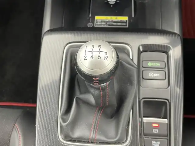 ホンダ シビック EX 群馬県 2021(令3)年 1.8万km プラチナホワイトパール ・MT車（６速マニュアル）/・禁煙車/・アクティブコーナリングライト/・純正９インチコネクトナビ/フルセグTV/AM/FM/Bluetooth/USB/スマホ連動/・BOSEサウンド/・ワイヤレス充電/・ホンダセンシング/衝突軽減ブレーキ/誤発進抑制機能/後方誤発進抑制機能/近距離衝突軽減ブレーキ/歩行者事故軽減ステアリング/路外逸脱抑制機能/渋滞追従機能付/BSM/・LEDライト/・ハーフレザーシート（D・Nパワーシート/シートヒーター）/・テールゲートスポイラー/・ETC2.0 /・ドラレコ/・無限フロアマット/＝＝＝＝＝/６速マニュアル　アクティブコーナリングライト　純正９インチコネクトナビ　ＢＯＳＥサウンド　ワイヤレス充電　ホンダセンシング　ＢＳＭ　ハーフレザーシート　ＥＴＣ２．０　ドラレコ　無限フロアマット　禁煙車