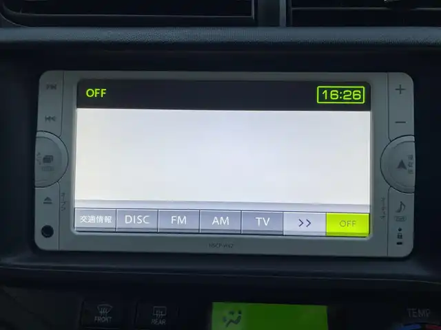 トヨタ アクア G 東京都 2013(平25)年 6.4万km ライムホワイトパールクリスタルシャイン モデリスタフルエアロ/大型リアスポイラー/ワンオーナー/純正メモリーナビ/　ワンセグTV/CD/Bluetooth/ETC/社外15インチアルミホイール/革巻きステアリングホイール/オートライト/プッシュスタート/ヘッドライトレベライザー/電動格納ミラー/ウインカーミラー/純正フロアマット/保証書/取扱説明書