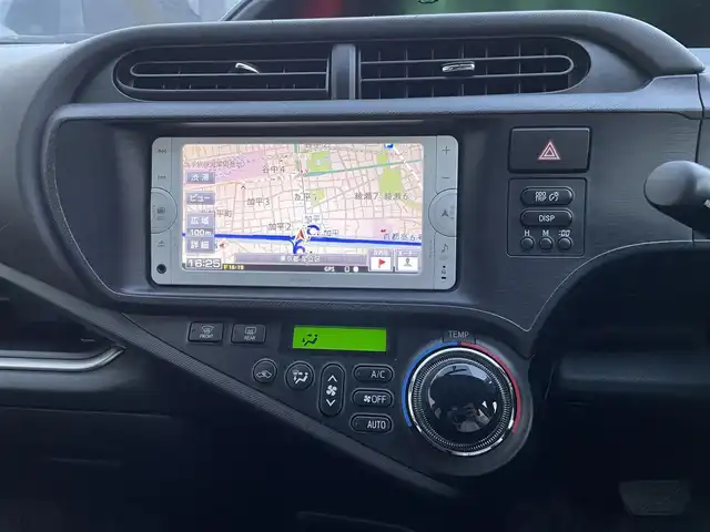 トヨタ アクア G 東京都 2013(平25)年 6.4万km ライムホワイトパールクリスタルシャイン モデリスタフルエアロ/大型リアスポイラー/ワンオーナー/純正メモリーナビ/　ワンセグTV/CD/Bluetooth/ETC/社外15インチアルミホイール/革巻きステアリングホイール/オートライト/プッシュスタート/ヘッドライトレベライザー/電動格納ミラー/ウインカーミラー/純正フロアマット/保証書/取扱説明書