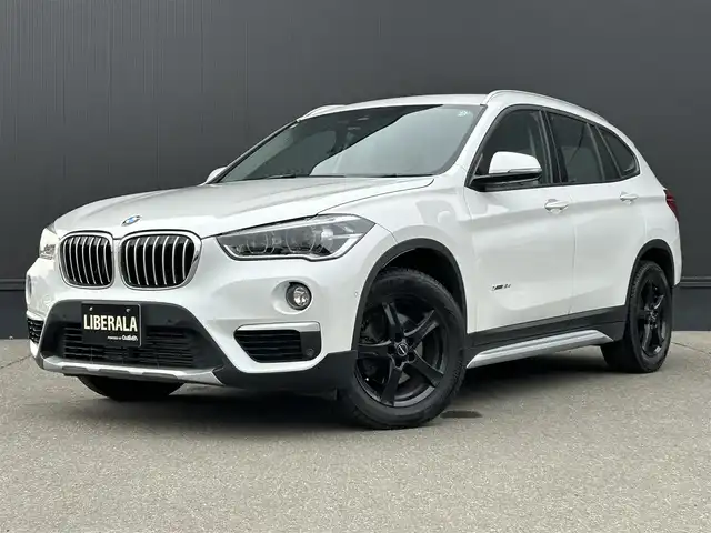 ＢＭＷ Ｘ１ xDrive 18d xライン 道東・釧路十勝 2017(平29)年 4.9万km ミネラルホワイト 純正HDDナビ/CD/DVD/BT/USB/コーナーセンサー(前後)/バックカメラ/パワーバックドア/ハーフレザーシート/LEDヘッドライト/オートライト/フロント/リアフォグライト/ミラーETC/純正フロアマット/インテリジェントセーフティ/ダウンヒルアシストコントロール/革巻ステアリング/リモコン/プッシュスタート/スマートキー/スペア1本