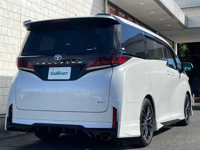 トヨタ ヴェルファイア ハイブリット Z プレミア 埼玉県 2023(令5)年 2.6万km プラチナホワイトパールマイカ ワンオーナー/AIS検査済み/GRフルエアロ/純正ナビゲーション/・フルセグテレビ/・AppleCarPlay/・AndroidAuto/・BT/トヨタチームメイト/セーフティセンス（予防安全パッケージ）/レーダークルーズコントロール/レーンキープ/ブラインドスポットモニター/パーキングブレーキサポート/オートパーキング/ヘッドアップディスプレー/オートマチックハイビーム/パノラミックビューカメラ/パノラマルーフ/デジタルインナーミラー/前後ドライブレコーダー/1、2列目快適温熱シート/運転席&助手席パワーシート/2列目エグゼクティブパワーシート/ハンドルヒーター/置くだけ充電/両側パワースライドドア/パワーバックドア/LEDフロントフォグランプ/100V電源